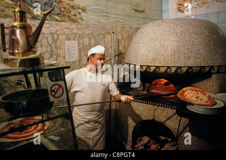 Naples. Italy. Chefs at work at the Trianon Pizzeria. Stock Photo