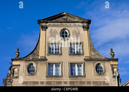 Ornate roofline of tenement house in the Old Town of Gdansk (Danzig), Poland Stock Photo