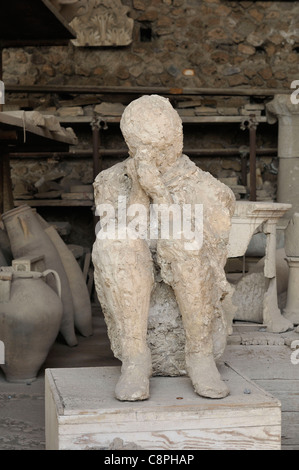 Pompei. Italy. Plaster cast of victim of the eruption of Vesuvius, Pompeii archaeological site. Stock Photo