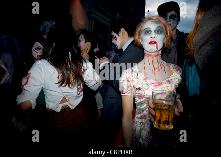 A young woman at the Zombie Walk and pub crawl for Halloween Piccadilly Circus London 2011. Stock Photo