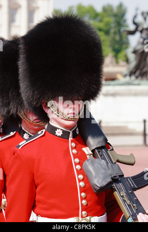 Foot Guards with machine guns on Parade outside Buckingham Palace, London, United Kingdom. Stock Photo