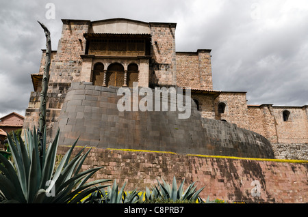 Santo Domingo convent with Inca curve wall built on top of the Inca Temple of the Sun Cusco Peru Stock Photo