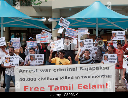 Protesters with Free Tamil Eelam banner demonstrating against Sri Lankan President Mahendra Rajapakse at CHOGM 2011 protests. Stock Photo