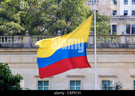 The Colombian flag streaming in the wind at the Casa Narino presidential palace in Bogota, Colombia. Stock Photo