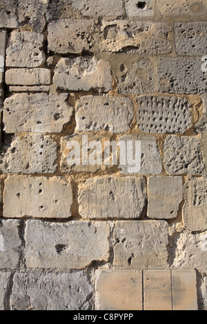 Medieval stone wall in limestone at Noyon, France Stock Photo