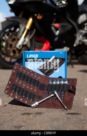 Laser socket set pack shot in front of motorbike UK Stock Photo