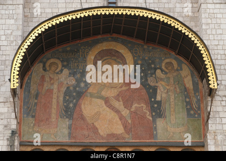 Fresco of the Virgin of Vladimir over the main gate of the Dormition Cathedral in Moscow Kremlin, Russia. Stock Photo