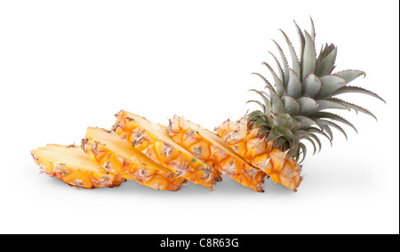 Cut baby pineapple with its slices isolated on white background Stock Photo