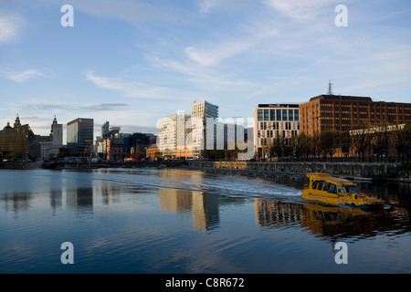 Albert dock in Liverpool UK with yellow duckmarine guide tour amphibious vehicle 2011 Stock Photo