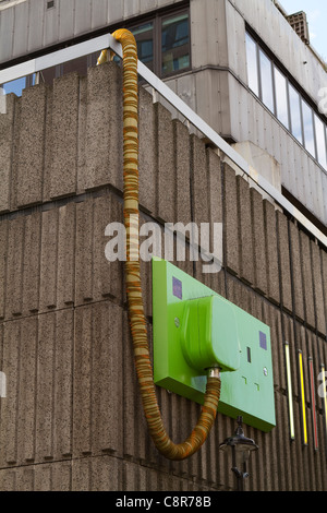 Large green plug on the corner of Ganton Street in Soho, London Stock Photo