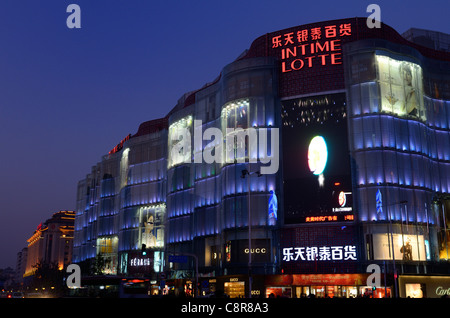 Intime Lotte department store in Beijing at night Peoples Republic of China Stock Photo