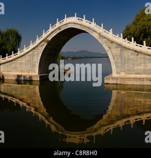 Xiuyi Bridge at south end of Kunming Lake and Pavilion of Brilliant Views at Summer Palace Beijing China Stock Photo