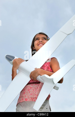 Girl with model plane Stock Photo