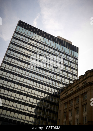 Old with new Co-op buildings in Manchester UK Stock Photo