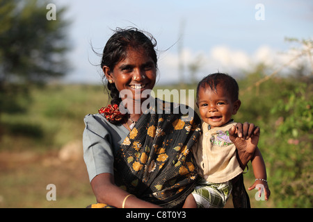 Lower caste mother with her child playing Andhra Pradesh South India ...