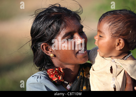 Lower caste mother with her child playing Andhra Pradesh South India ...