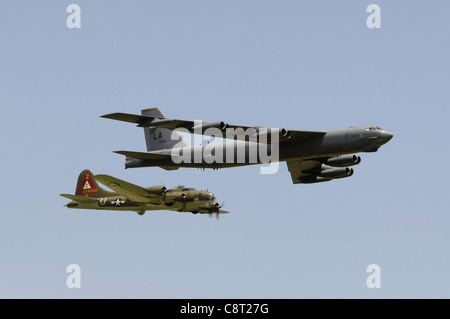 A B-17G Flying Fortress and a B-52H Stratofortress fly in a heritage flight formation May 13 during the 2006 Defenders of Liberty Airshow at Barksdale Air Force Base, La. These two aircraft represent 70 years of 'fortresses.' It was the first time in 50 years that they flew together in formation. Stock Photo