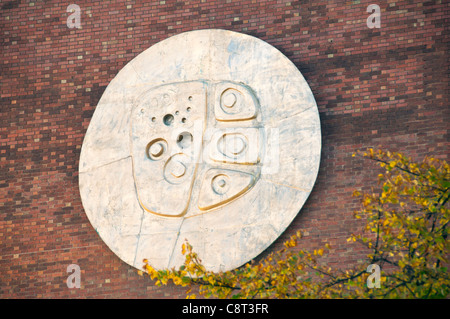 Artwork or badge on the Williamson Building, University of Manchester, England, UK Stock Photo