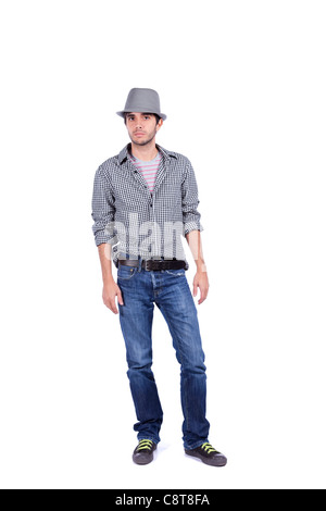 Young handsome man with a modern style, jeans, shirt and a hat Stock Photo
