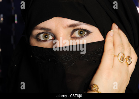 Close up picture of a Muslim woman wearing a black veil Stock Photo