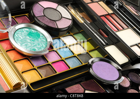 Lot of decorative colorful makeup sets , close up shot Stock Photo