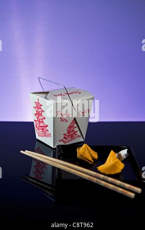 American Chinese carry-out containers, chopsticks and fortune cookies. Stock Photo