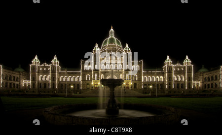 Water Fountain by Parliament Buildings in Victoria BC Canada at Night Stock Photo