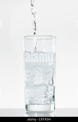 Studio shot of water being poured into glass Stock Photo