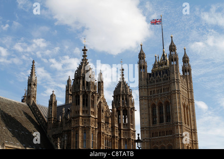 Union Jack flag on Victoria Tower - Westminster Abbey in London. Stock Photo