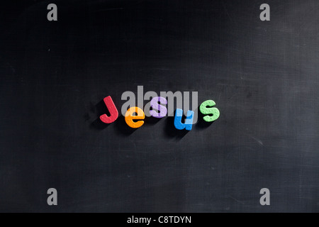 Single word 'Jesus' in multi colored alphabets Stock Photo