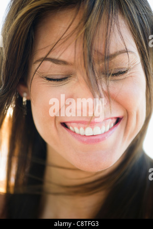 Portrait of a woman, eyes closed, smiling Stock Photo - Alamy