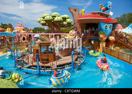 Magic Fish water carousel for children in Port Aventura amusement park. Salou, Catalonia, Spain. Stock Photo