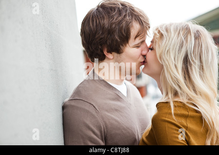 USA, Washington, Seattle, Young couple kissing Stock Photo