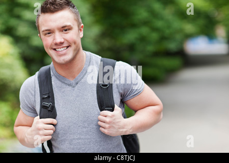 USA, Washington, Seattle, Portrait of male college student smiling Stock Photo