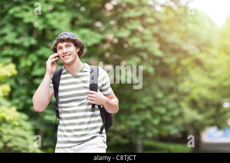 USA, Washington, Seattle, Male college student talking on cell phone Stock Photo