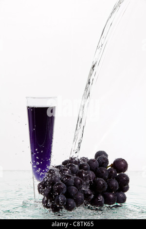 Water Pouring On Grapes Stock Photo