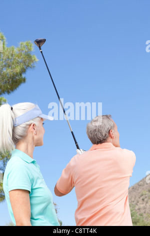 USA, Arizona, Scottsdale, Couple playing golf Stock Photo