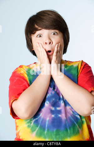 Studio portrait of boy in colorful shirt Stock Photo