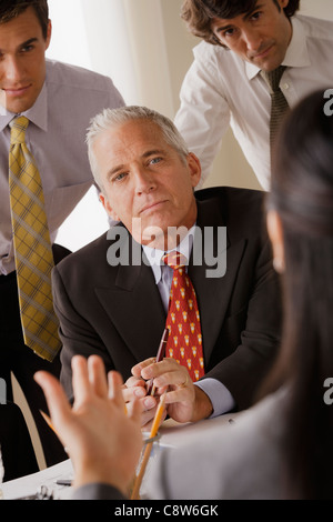 Businessmen at business meeting Stock Photo