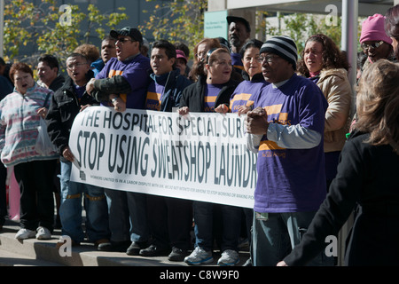 Laundry workers protest alleged sweatshop conditions by hospital subcontractor Stock Photo