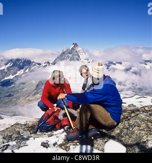 Climbers in front of the Matterhorn's peak Zermatt Valais Switzerland Stock Photo