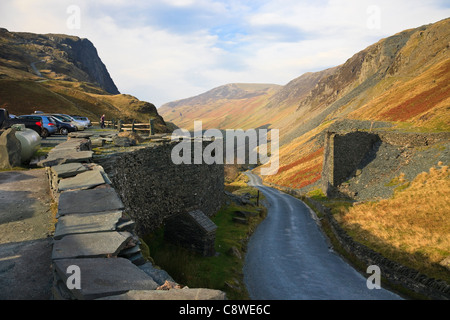 View down narrow road to Gatesgarthdale valley from Slate Mine in Lake District National Park Honister Pass Cumbria England UK Britain Stock Photo