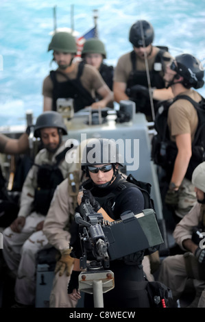 Members of the visit, board, search and seizure team Stock Photo