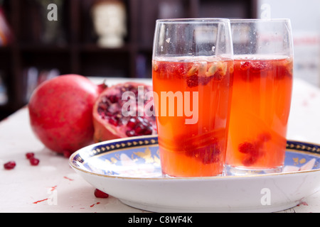 A fresh spritzer made from watermelons and pomegranate seeds Stock Photo
