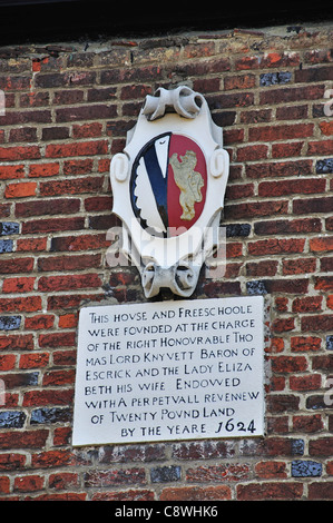 Plaque on wall of Old Free School, High Street, Stanwell Village, Surrey, England, United Kingdom Stock Photo