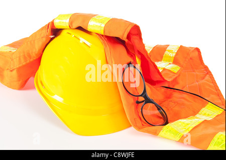 Hard hat, reflective orange vest and safety glasses on white. Stock Photo