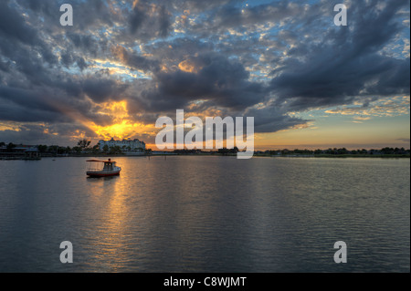 Sunset on  Lake Sumter Cherry Lake located in The Villages, Florida USA.  A golf retirement community for 55 and above. Stock Photo