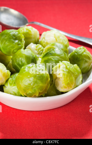 cooked brussels sprouts in bowl Stock Photo