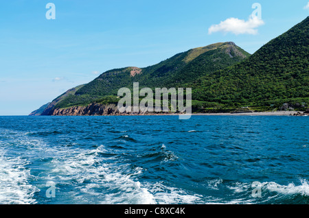 View of Cabot Trail from boat Cape Breton Island Nova Scotia Canada Stock Photo