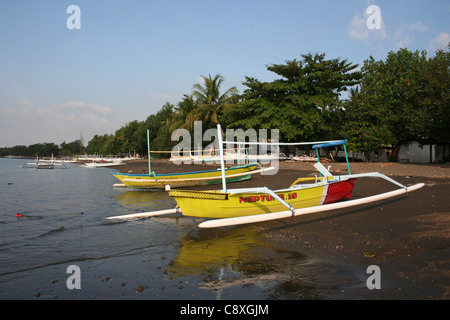 Traditional Fishing Boats Called Jukung On Lovina Beach, Bali Stock Photo